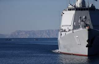 Warships sail in the Sea of Oman during the first day of joint Iran, Russia and China naval war games in Chabahar port, at the Sea of Oman, Iran, December 27, 2019. Picture taken December 27, 2019. Mohsen Ataei/Fars news agency/WANA (West Asia News Agency