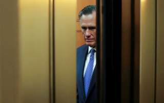 U.S. Senator Mitt Romney (R-UT) rides in a U.S. Capitol elevator to the U.S. Senate floor to cast a guilty vote during the final votes in the Senate impeachment trial of U.S. President Donald Trump on Capitol Hill in Washington, U.S., February 5, 2020. RE