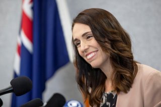New Zealand Prime Minister Jacinda Ardern smiles during a news conference prior to the anniversary of the mosque attacks that took place the prior year in Christchurch, New Zealand, March 13, 2020. REUTERS/Martin Hunter