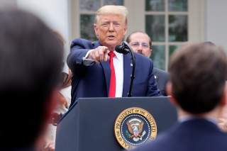 U.S. President Donald Trump takes questions during a news conference where the president declared the coronavirus pandemic a national emergency in the Rose Garden of the White House in Washington, U.S., March 13, 2020. REUTERS/Jonathan Ernst