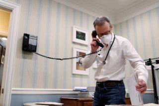 Dr Greg Gulbransen takes part in a telemedicine call with a patient while maintaining visits with both his regular patients and those confirmed to have the coronavirus disease (COVID-19) at his pediatric practice in Oyster Bay, New York, U.S., April 13, 2