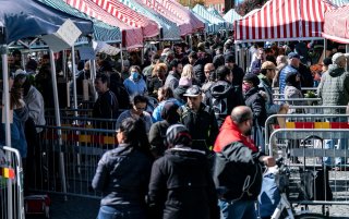 People buy vegetables as the fences and information signs are placed to reduce congestion due to the coronavirus disease (COVID-19) in Mollevangstorget, in Malmo, Sweden April 25, 2020 TT News Agency/Johan Nilsson via REUTERS