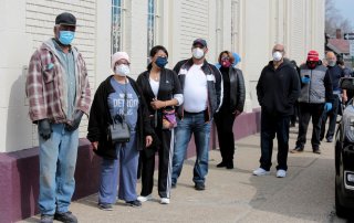 Detroit residents line-up to be tested for free for the coronavirus disease (COVID-19) at the Sheffield Center in Detroit, Michigan, U.S., April 28, 2020. REUTERS/Rebecca Cook