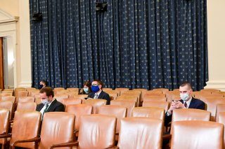Audience members practice social distancing as the House Rules Committee meets to consider a resolution authorizing remote voting by proxy in the House of Representatives during a public health emergency due to the coronavirus disease (COVID-19) outbreak,