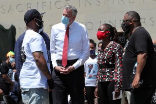 Terrence Floyd (L) George Floyd's brother, speaks with New York City Mayor Bill de Blasio as they attend a public memorial after the death in Minneapolis police custody of George Floyd in the Brooklyn borough of New York City, New York, U.S., June 4, 2020