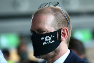 Lufthansa employee wearing face a mask takes part in a protest against the reduction of the number of jobs due to the outbreak of the coronavirus disease (COVID-19), at the airport in Frankfurt, Germany, June 19, 2020. REUTERS/Ralph Orlowski