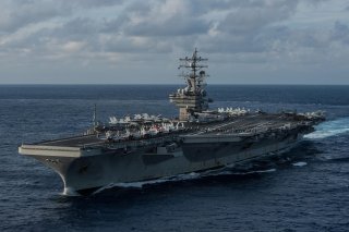 The U.S. Navy's forward-deployed aircraft carrier USS Ronald Reagan (CVN 76) transits the Philippine Sea ahead of Annual Exercise. 15 Nov. 2015. U.S. Navy/Mass Communication Specialist 3rd Class Nathan Burke.