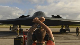U.S. Air Force maintainers assigned to the 393rd Expeditionary Bomb Squadron, deployed from Whiteman Air Force Base, Missouri, secure a B-2 Spirit Stealth Bomber after a flight at Naval Support Facility Diego Garcia, to support a Bomber Task Force mission