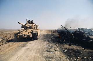 Israeli tank on the Golan Heights during the Arab-Israeli War - © Henri Bureau.Sygma/CORBIS. From the booklet 