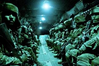 Paratroopers with the 82nd Airborne Division’s 1st Brigade Combat Team and Afghan National Army soldiers with 6th Kandak, 203rd Corps, travel aboard a CH-47 Chinook heavy lift helicopter during an air assault mission May 4, 2012, Ghazni Province, Afghanis