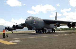 HICKAM AIR FORCE BASE, Hawaii -- A B-52 Stratofortress is prepared for take off on the runway April 6. Four B-52s arrived here from Andersen Air Force Base, Guam, to escape Typhoon Sudal which missed the island April 7.