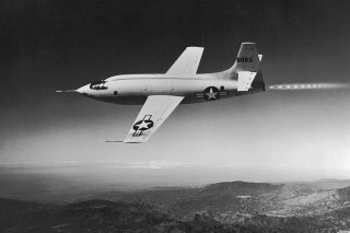 The #46-062 Bell X-1 rocket-powered experimental aircraft (known for becoming the first piloted aircraft to fly faster than Mach 1, or the speed of sound, on October 14, 1947) photographed during a test flight. NASA.