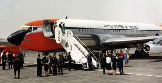 Arrival in Mexico City. President and Mrs. Kennedy debark Air Force One. Mexico City, Mexico, International Airport.