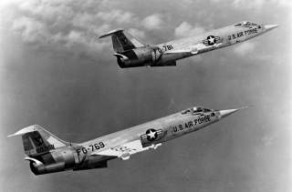 A formation of two U.S. Air Force Lockheed F-104A-15-LO Starfighters (s/n 56-0769 and 56-0781) in flight. Circa 1960. National Museum of the US Air Force.