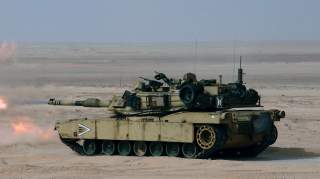 Marines from the 13th Marine Expeditionary Unit (13th MEU) Tank Platoon BLT 1/1 stationed at Twentynine Palms, Calif., fire the M1A1 Abrams tank during a live fire training exercise. 13th MEU is assigned to USS Peleliu (LHA 5) Expeditionary Strike Group O