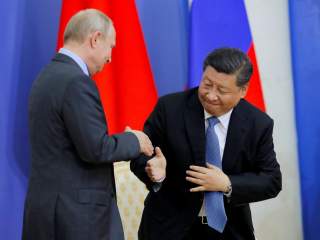https://pictures.reuters.com/archive/RUSSIA-FORUM-PUTIN-XI-RC19AD0CB3F0.html