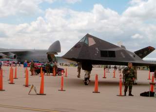 https://www.dvidshub.net/image/760216/f-117-stealth-bomber-with-c-5a-transport-background-flight-line-wright-patterson-air-force