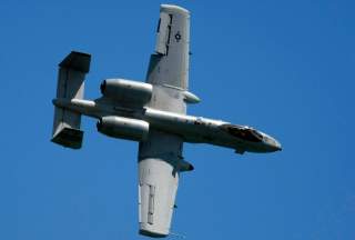 A U.S. Air Force (USAF) A-10 Thunderbolt II ground-attack aircraft performs a manoeuvre during the Singapore Airshow February 2, 2010. REUTERS/Tim Chong (SINGAPORE - Tags: BUSINESS TRANSPORT MILITARY)