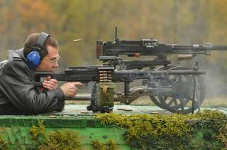 Russia's Prime Minister Dmitry Medvedev takes part in testing small arms at the training ground of the Central Research Institute for Precision Machine Building in Klimovsk, Moscow Region October 3, 2012. REUTERS/Alexander Astafyev/RIA Novosti/Pool (RUSSI