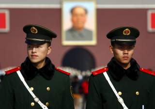 Paramilitary policemen stand guard on Beijing's Tiananmen Square November 6, 2012 as security is tightened around the square and the adjoining Great Hall of the People. Just days before the party's all-important congress opens, China's stability-obsessed 