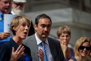 New York State democratic governor candidate Zephyr Teachout (L) speaks next to lieutenant governor candidate running mate Tim Wu (2nd L) during a campaign event in New York September 3, 2014.