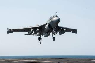 An EA-6B Prowler attached to the Garudas of Electronic Attack Squadron (VAQ) 134 lands aboard the aircraft carrier USS George H.W. Bush (CVN 77) after conducting strike missions against the Islamic State of Iraq and the Levant (ISIL)