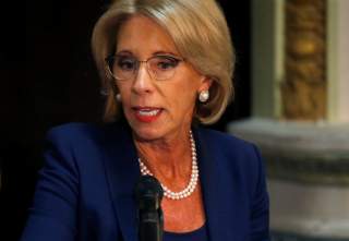 U.S. Education Secretary Betsy DeVos takes part in a Federal Commission on School Safety meeting at the White House in Washington, D.C., U.S., August 16, 2018. REUTERS/Leah Millis