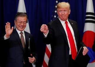 U.S. President Donald Trump and South Korean President Moon Jae-in gesture after signing the U.S.-Korea Free Trade Agreementon during a ceremony on the sidelines of the 73rd United Nations General Assembly in New York, U.S., September 24, 2018. REUTERS/Ca
