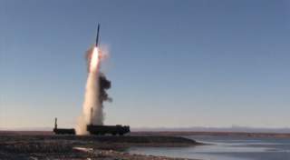 A still image taken from a video footage and released by Russia's Defence Ministry on September 26, 2018, shows the launch by Bastion coastal defence system of a supersonic anti-ship Oniks missile during tactical drills by North Navy Fleet at Kotelny Isla