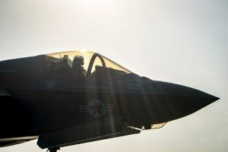 A F-35B Lightning II aircraft from the Marine Fighter Attack Squadron 211 goes through pre-flight checks before launch aboard the amphibious assault ship USS Essex as part of the F-35B's first combat strike, against a Taliban target in Afghanistan, Septem