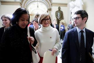 U.S. Reps Susie Lee (D-NV) is followed by Rep. Jahana Hayes (D-CT), Rep. Katie Hill (D-CA) (L) and other freshmen House Democrats as they arrive at Senate Majority Leader Mitch McConnell's (R-KY) office to deliver a letter 