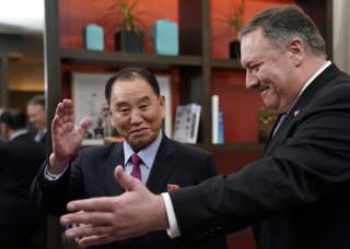 U.S. Secretary of State Mike Pompeo stands with Vice Chairman of the North Korean Workers' Party Committee Kim Yong Chol, North Korea's lead negotiator in nuclear diplomacy with the United States, for talks aimed at clearing the way for a second U.S.-Nort