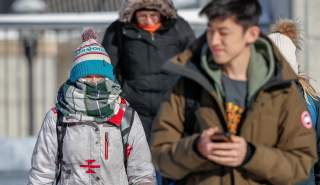 A student dressed for sub-zero temperatures walks to class at the University of Minnesota in Minneapolis, Minnesota, U.S., January 29, 2019. REUTERS/Eric Miller