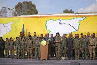 Mazloum Kobani, Syrian Democratic Forces' (SDF) commander in chief, talks as he announces the destruction of Islamic State's control of land in eastern Syria, at al-Omar oil field in Deir Al Zor, Syria March 23, 2019.