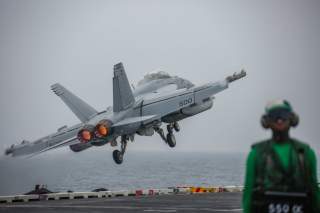 An EA-18G Growler attached to the 