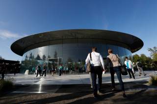 Guests arrive for at the Steve Jobs Theater for an Apple event at their headquarters in Cupertino, California, U.S. September 10, 2019. REUTERS/Stephen Lam