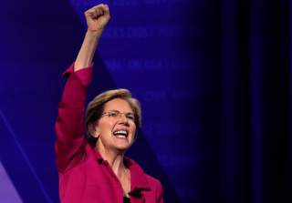 FILE PHOTO: Democratic 2020 U.S. presidential candidate Senator Elizabeth Warren (D-MA) gestures in a televised townhall on CNN dedicated to LGBTQ issues in Los Angeles, California, U.S. October 10, 2019. REUTERS/Mike Blake/File Photo