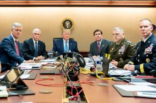 U.S. President Donald Trump, U.S. Vice President Mike Pence (2nd L), U.S. Secretary of Defense Mark Esper (3rd R), along with members of the national security team, watch as U.S. Special Operations forces close in on ISIS leader Abu Bakr al-Baghdadi