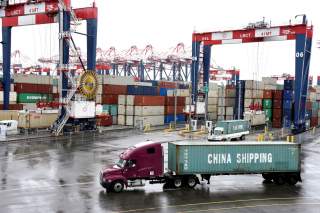 FILE PHOTO: Containers are seen at the port in San Pedro, California, U.S., March 22, 2018. REUTERS/Bob Riha, Jr./File Photo