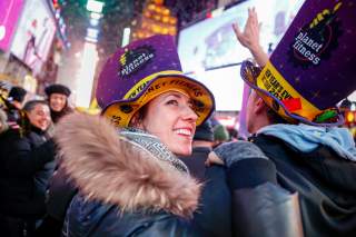 Revelers celebrate the New Year in Times Square in the Manhattan borough of New York City, U.S., January 1, 2020. REUTERS/Amr Alfiky