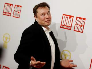 FILE PHOTO: SpaceX owner and Tesla CEO Elon Musk arrives on the red carpet for the automobile awards 