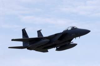 A U.S. Air Force F-15 Eagle fighter flies during a certification of the arresting gear in the military air base in Lielvarde, Latvia, May 19, 2016. REUTERS/Ints Kalnins