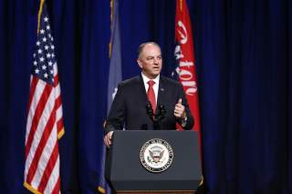 Louisiana Governor John Bel Edwards speaks during a memorial service for three slain Baton Rouge police officers at Healing Place Church in Baton Rouge, Louisiana, U.S. July 28, 2016. REUTERS/Jonathan Bachman