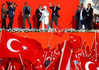 Turkish President Tayyip Erdogan and his wife Emine Erdogan attend Democracy and Martyrs Rally, organized by him and supported by ruling AK Party (AKP), oppositions Republican People's Party (CHP) and Nationalist Movement Party (MHP), to protest against l