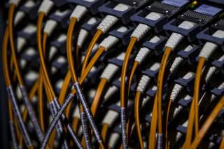 A picture shows wires at the back of a super computer at the Konrad-Zuse Centre for applied mathematics and computer science, in Berlin August 13, 2013. REUTERS/Thomas Peter 