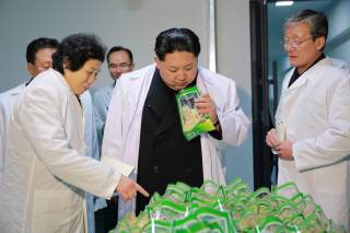 North Korean leader Kim Jong Un (C) visits the Kumkop General Foodstuff Factory for Sportspersons in this undated photo released by North Korea's Korean Central News Agency (KCNA) in Pyongyang January 23, 2016.