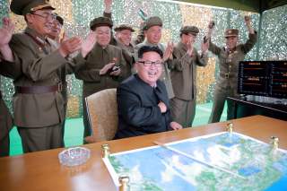 North Korean leader Kim Jong Un reacts during a test launch of ground-to-ground medium long-range ballistic rocket Hwasong-10 in this undated photo released by North Korea's Korean Central News Agency (KCNA) on June 23, 2016. REUTERS/KCNA