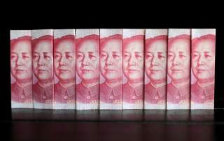 Chinese 100 yuan banknotes are seen in this picture illustration taken in Beijing July 11, 2013. REUTERS/Jason Lee/File Photo