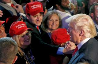 Donald Trump greets supporters at his election night rally in Manhattan. REUTERS/Carlo Allegri