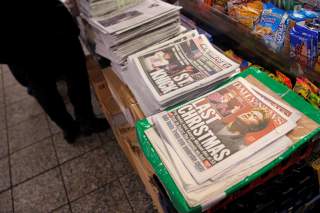 A newstand sells newspapers featuring the image of late singer George Michael in Manhattan, New York City, U.S., December 26, 2016. REUTERS/Andrew Kelly